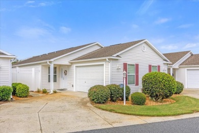 Welcome to this charming 3-bedroom, 2-bathroom bungalow villa on Egret Championship Golf Course in Florida - for sale on GolfHomes.com, golf home, golf lot