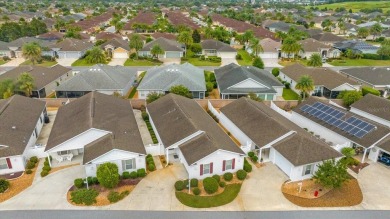 Welcome to this charming 3-bedroom, 2-bathroom bungalow villa on Egret Championship Golf Course in Florida - for sale on GolfHomes.com, golf home, golf lot