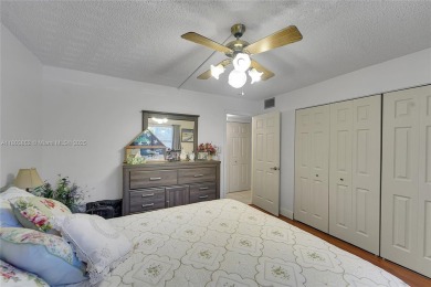 Updated custom kitchen, bathroom and floors, beautiful view of on Sunrise Lakes Phase III in Florida - for sale on GolfHomes.com, golf home, golf lot