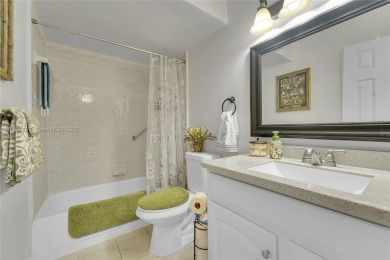 Updated custom kitchen, bathroom and floors, beautiful view of on Sunrise Lakes Phase III in Florida - for sale on GolfHomes.com, golf home, golf lot