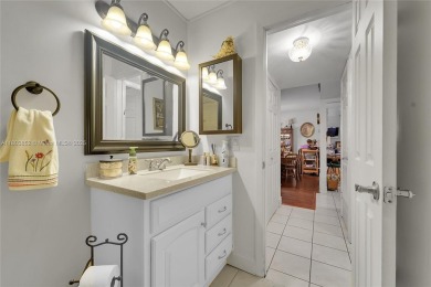 Updated custom kitchen, bathroom and floors, beautiful view of on Sunrise Lakes Phase III in Florida - for sale on GolfHomes.com, golf home, golf lot