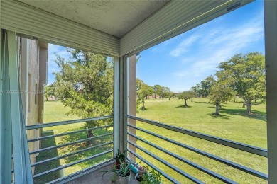 Updated custom kitchen, bathroom and floors, beautiful view of on Sunrise Lakes Phase III in Florida - for sale on GolfHomes.com, golf home, golf lot