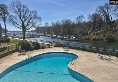 Come home and relax overlooking the water and boats in the cove on Club At Rawls Creek in South Carolina - for sale on GolfHomes.com, golf home, golf lot