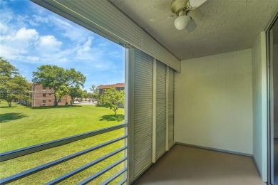 Updated custom kitchen, bathroom and floors, beautiful view of on Sunrise Lakes Phase III in Florida - for sale on GolfHomes.com, golf home, golf lot
