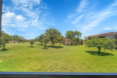 Updated custom kitchen, bathroom and floors, beautiful view of on Sunrise Lakes Phase III in Florida - for sale on GolfHomes.com, golf home, golf lot