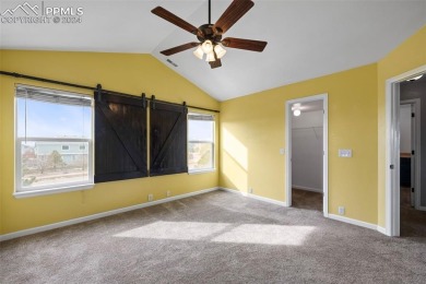 This lovely, spacious Woodmen Hill home awaits you.  Great curb on Antler Creek Golf Course in Colorado - for sale on GolfHomes.com, golf home, golf lot