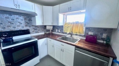 This home has been completely remodeled inside (2023-2024); with on Riverbend Golf and Country Club in Florida - for sale on GolfHomes.com, golf home, golf lot