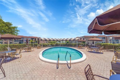 Updated custom kitchen, bathroom and floors, beautiful view of on Sunrise Lakes Phase III in Florida - for sale on GolfHomes.com, golf home, golf lot