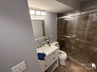 Located in the prestigious Rumbling Bald on Lake Lure, this on Rumbling Bald Resort on Lake Lure in North Carolina - for sale on GolfHomes.com, golf home, golf lot