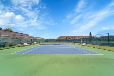Updated custom kitchen, bathroom and floors, beautiful view of on Sunrise Lakes Phase III in Florida - for sale on GolfHomes.com, golf home, golf lot