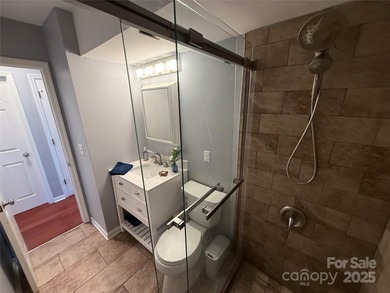 Located in the prestigious Rumbling Bald on Lake Lure, this on Rumbling Bald Resort on Lake Lure in North Carolina - for sale on GolfHomes.com, golf home, golf lot