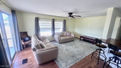 This home has been completely remodeled inside (2023-2024); with on Riverbend Golf and Country Club in Florida - for sale on GolfHomes.com, golf home, golf lot