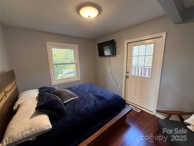 Located in the prestigious Rumbling Bald on Lake Lure, this on Rumbling Bald Resort on Lake Lure in North Carolina - for sale on GolfHomes.com, golf home, golf lot