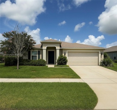 Beautiful golf course home in the 55+ gated community of on Arlington Ridge Golf Club in Florida - for sale on GolfHomes.com, golf home, golf lot