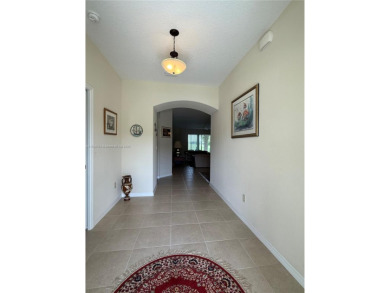 Beautiful golf course home in the 55+ gated community of on Arlington Ridge Golf Club in Florida - for sale on GolfHomes.com, golf home, golf lot
