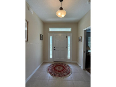 Beautiful golf course home in the 55+ gated community of on Arlington Ridge Golf Club in Florida - for sale on GolfHomes.com, golf home, golf lot