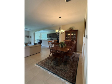 Beautiful golf course home in the 55+ gated community of on Arlington Ridge Golf Club in Florida - for sale on GolfHomes.com, golf home, golf lot