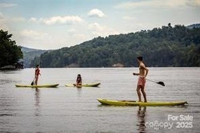 Located in the prestigious Rumbling Bald on Lake Lure, this on Rumbling Bald Resort on Lake Lure in North Carolina - for sale on GolfHomes.com, golf home, golf lot