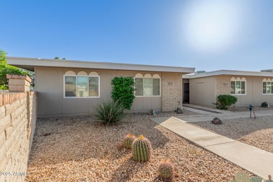 Welcome to this charming end unit in the 55+ Dawn Camp at in on Sun City Riverview Golf Course in Arizona - for sale on GolfHomes.com, golf home, golf lot