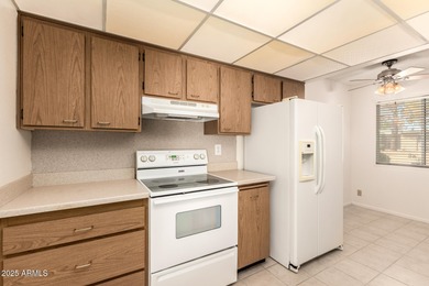 Welcome to this charming end unit in the 55+ Dawn Camp at in on Sun City Riverview Golf Course in Arizona - for sale on GolfHomes.com, golf home, golf lot