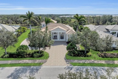 This custom residence in the prestigious Founders Club blends on The Founders Golf Club in Florida - for sale on GolfHomes.com, golf home, golf lot