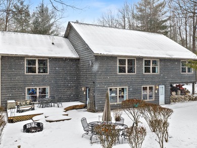 Welcome to this beautifully crafted riverfront home along the on Thunder Bay Golf Resort in Michigan - for sale on GolfHomes.com, golf home, golf lot