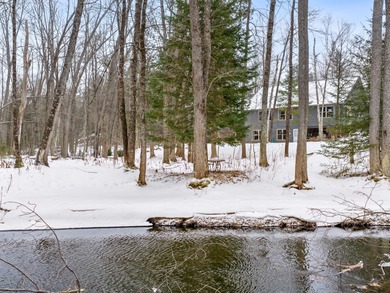 Welcome to this beautifully crafted riverfront home along the on Thunder Bay Golf Resort in Michigan - for sale on GolfHomes.com, golf home, golf lot