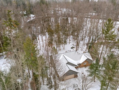 Welcome to this beautifully crafted riverfront home along the on Thunder Bay Golf Resort in Michigan - for sale on GolfHomes.com, golf home, golf lot