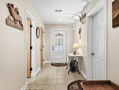 Welcome to this beautifully crafted riverfront home along the on Thunder Bay Golf Resort in Michigan - for sale on GolfHomes.com, golf home, golf lot