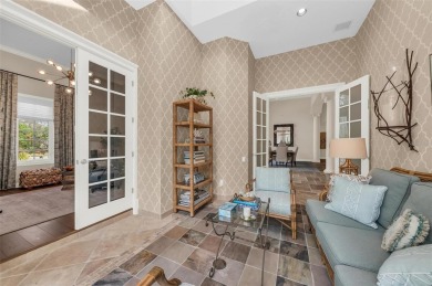 This custom residence in the prestigious Founders Club blends on The Founders Golf Club in Florida - for sale on GolfHomes.com, golf home, golf lot