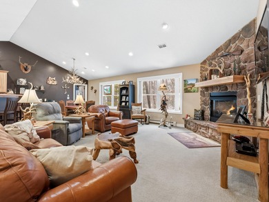 Welcome to this beautifully crafted riverfront home along the on Thunder Bay Golf Resort in Michigan - for sale on GolfHomes.com, golf home, golf lot