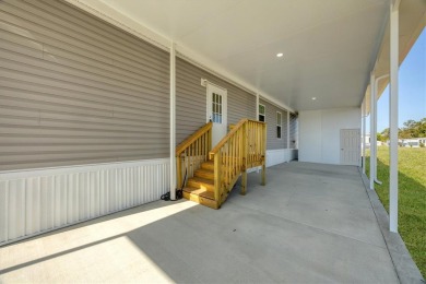 Beautiful brand new 2025 Champion home located in an extremely on Sabal Trace Golf and Country Club in Florida - for sale on GolfHomes.com, golf home, golf lot