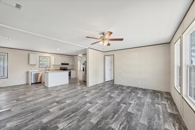 Beautiful brand new 2025 Champion home located in an extremely on Sabal Trace Golf and Country Club in Florida - for sale on GolfHomes.com, golf home, golf lot