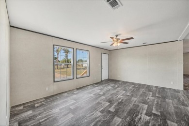 Beautiful brand new 2025 Champion home located in an extremely on Sabal Trace Golf and Country Club in Florida - for sale on GolfHomes.com, golf home, golf lot