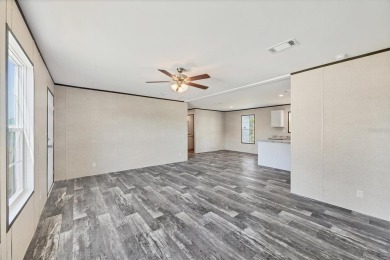 Beautiful brand new 2025 Champion home located in an extremely on Sabal Trace Golf and Country Club in Florida - for sale on GolfHomes.com, golf home, golf lot