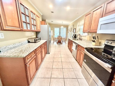 Live the lifestyle of luxury and convenience in this stunning on Crane Lakes Golf and Country Club in Florida - for sale on GolfHomes.com, golf home, golf lot