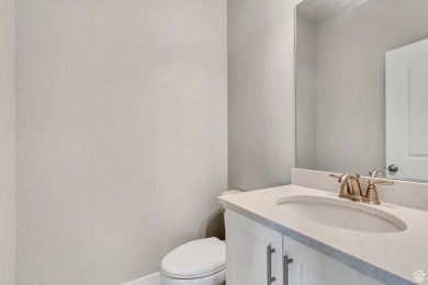 Enjoy laminate floors, an open kitchen with quartz counters on The Ranches Golf Club in Utah - for sale on GolfHomes.com, golf home, golf lot