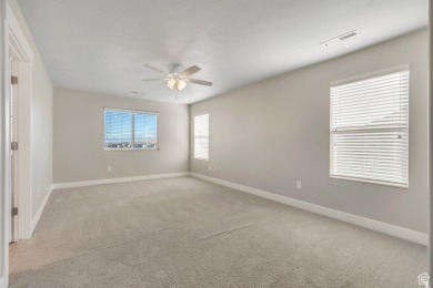 Enjoy laminate floors, an open kitchen with quartz counters on The Ranches Golf Club in Utah - for sale on GolfHomes.com, golf home, golf lot