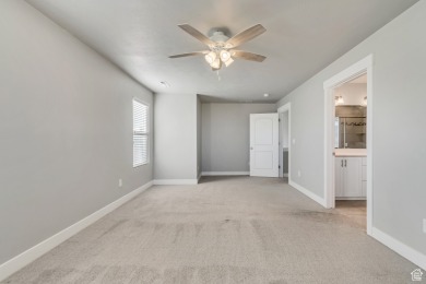 Enjoy laminate floors, an open kitchen with quartz counters on The Ranches Golf Club in Utah - for sale on GolfHomes.com, golf home, golf lot