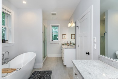 This elegant four-bedroom home, built in 2021, is perfectly on The Club at River Oaks in Connecticut - for sale on GolfHomes.com, golf home, golf lot
