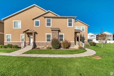 Enjoy laminate floors, an open kitchen with quartz counters on The Ranches Golf Club in Utah - for sale on GolfHomes.com, golf home, golf lot