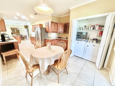 Live the lifestyle of luxury and convenience in this stunning on Crane Lakes Golf and Country Club in Florida - for sale on GolfHomes.com, golf home, golf lot