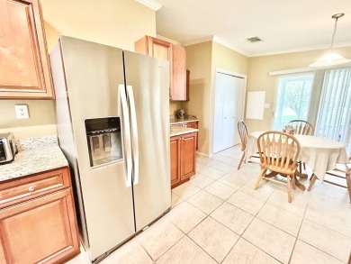 Live the lifestyle of luxury and convenience in this stunning on Crane Lakes Golf and Country Club in Florida - for sale on GolfHomes.com, golf home, golf lot