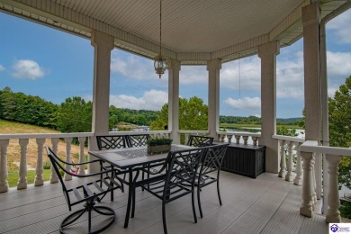 Enjoy stunning Doe Valley Lake views from this beautiful condo! on Doe Valley Country Club in Kentucky - for sale on GolfHomes.com, golf home, golf lot