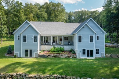 This elegant four-bedroom home, built in 2021, is perfectly on The Club at River Oaks in Connecticut - for sale on GolfHomes.com, golf home, golf lot
