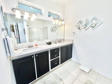 Live the lifestyle of luxury and convenience in this stunning on Crane Lakes Golf and Country Club in Florida - for sale on GolfHomes.com, golf home, golf lot