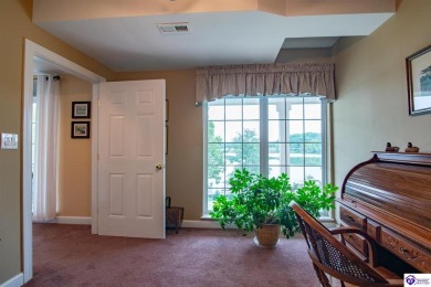 Enjoy stunning Doe Valley Lake views from this beautiful condo! on Doe Valley Country Club in Kentucky - for sale on GolfHomes.com, golf home, golf lot