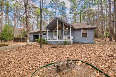 Adorable home on over .8 heavily wooded acres on a quiet on Holly Lake Ranch Golf Club in Texas - for sale on GolfHomes.com, golf home, golf lot