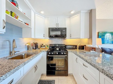 Great Location, fully remodeled and furnished with a modern on Hillsboro Pines Golf in Florida - for sale on GolfHomes.com, golf home, golf lot