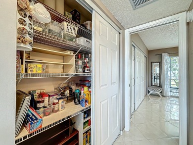 Great Location, fully remodeled and furnished with a modern on Hillsboro Pines Golf in Florida - for sale on GolfHomes.com, golf home, golf lot